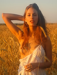 Cute brunette posing as a goddess of beauty in an outdoor scene that will leave you drooling.