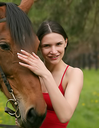 Katya N: Lusty brunette gal Katya N takes off her red lingerie and then rides her horse naked.