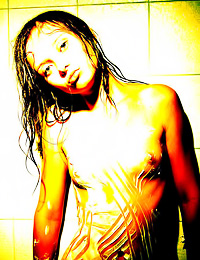 Anna S: Seductive brunette babe Anna S wears her nightwear as she takes a shower for the camera.