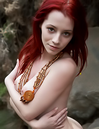 Ariel A: Smoking hot redhead babe Ariel A poses nude outdoors and shows her beautiful big jugs.