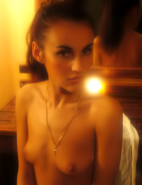 Horny teen princess Albione A takes off her white shirt and unveils her fabulous boobs.