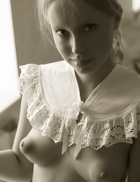 Seductive blonde hottie Koika slowly strips and shows us her round butt and juicy big breasts.