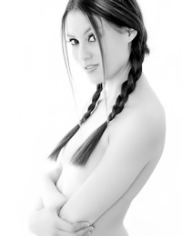 Seductive brunette model Jassie A takes her black gown and shows her trimmed cock hungry pussy.