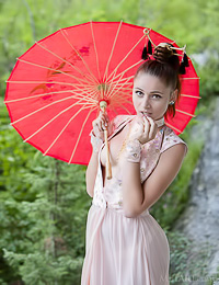 Endearing sexy gal poses naked outdoors revealing her big boobs and her shaved snatch.