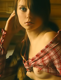 Delicious teen gal with small boobs takes off her tight shirt and shows her nice boobies.