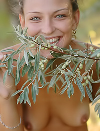 Charming teen cuttie Katy B teases us on her sofa wearing slutty little thongs and no bra.