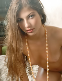 Lovely blonde chick Katya C takes off her little black thongs and shows her wet pussy.