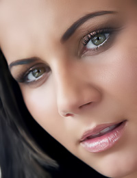 Cute and charming brunette Nataly D takes off her black lingerie set and shows here cleveage.