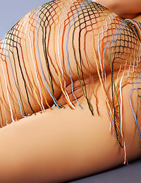 Smoking hot teen chick Viki E takes off her pink top and shows us her round perky tits.